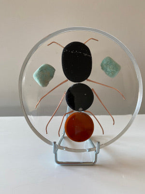 Disque de Lithothérapie, type Orgonite en resine avec ses pierres anti-ondes electromagnetiques modele Fourmi